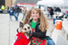 Woman and her dog as Jingles Elf