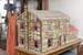 Detailed handcrafted model house exhibit displayed inside the Hamilton County Historical Museum.